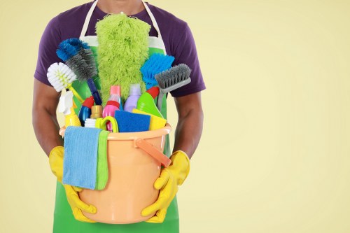 Office cleaning team working in a Belsizepark workplace reception area