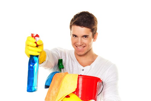 Cleaning team reviewing service details before beginning work